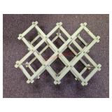 Collapsible wine rack - off train room