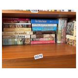 Shelf lot of vintage cook books (dining room)
