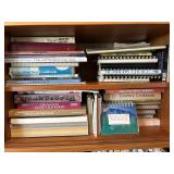Shelf lot of Cook Books (dining room)