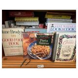 Shelf lot of cook books (dining room)