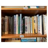 Shelf lot of cook books (dining room)
