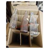 Nine vintage Pepsi bottles- off train room