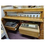 Vintage stereo cabinet with turntable and Bell