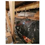 Metal weather vane - under house