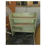 Wooden shelf- under house