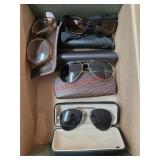 Sunglasses with cases - train room