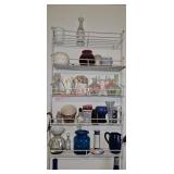 5 shelves of glassware (laundry room)