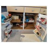 Crafting supplies in this cupboard- train room