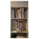 Craft books and magazines on top two shelves and