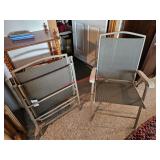 Two folding chairs- downstairs living room
