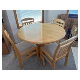 Dining room table and chairs with built in Leaf