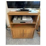 Smaller rolling TV stand- no contents  (dining