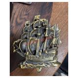 Brass ship door knocker  (Living Room)