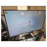 Samsung 55" TV and Remote (living room)