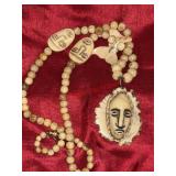 Carved bone or horn beads Large Pendant beaded