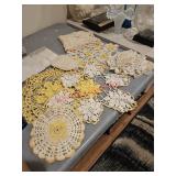 Doilies and such, some with stainsDownstairs