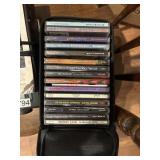 CDs in case ( downstairs bedroom)