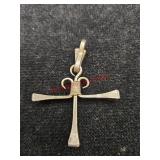 It's beautiful penant cross made from horseshoe,