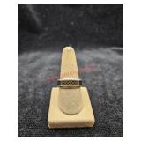 Size seven Stainless Steel and composite ring