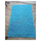 Rug, underneath is rubbery - living room