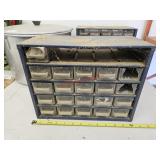 Another set of storage drawers with contents,