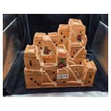 terracotta model depicts a Pueblo-style adobe