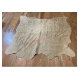cowhide rug (Downstairs left)