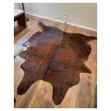 cowhide rug  (Downstairs left)