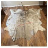 cowhide rug (Downstairs left)