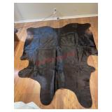 cowhide rug (Downstairs left)