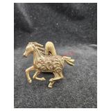 Brassy colored horse pendant  (Downstairs left)