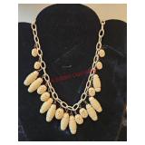 Carved necklace  (Downstairs left)