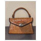 VTG brown leather handbag with hand tooled floral