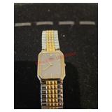 Seiko gold and silver colored watch