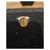 Size 13 Gold and silver colored ring MARKED STERL.