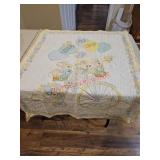 Vintage baby quilt with embroidery. Needs binding
