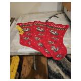 Three vintage christmas sockings and one vintage