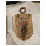 Antique wooden barn pulleyDownstairs left