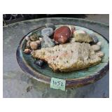 Ceramic (?) dish of rocks, dish chipped - back