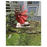 Windmill and squirrel yard decor- front of house