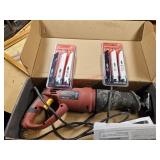 Sawzall with lots of new blades - shop