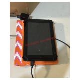 Amazon Kindle with charger - Powers on FOR PARTS