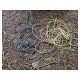 Extension cords, looks like 3 - front of house