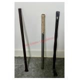 Crow bars and a bar of some sort (gym room)