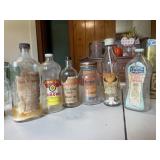 Vintage bottles and teeth(1st upstairs bedroom)