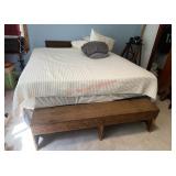 King size bed and bed frame with pillows and