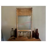 vintage  washboard and bottles (upstairs HW)