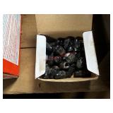 set of black automotive lug nuts (Barn)