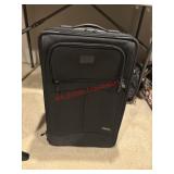 Rolling Black Luggage                (Basement