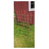 Vintage farm equipment yard art ( left side of